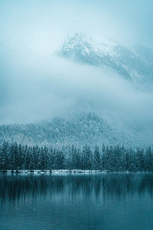 Frosty landscape with large lake.